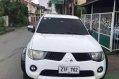 2009 Mitsubishi Strada White Pickup For Sale -0