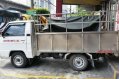 2010 Mitsubishi L300 stake body for sale -0