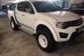 Mitsubishi Strada 2013 MT 4x4 for sale-0