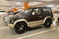 MITSUBISHI Pajero 3 door automatic 4x4 22 mags see and compare-0