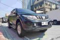 Selling Black Mitsubishi Strada 2016 Manual Diesel at 35000 km in Quezon City-6