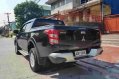 Selling Black Mitsubishi Strada 2016 Manual Diesel at 35000 km in Quezon City-2