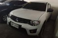 Selling White Mitsubishi Strada 2014 for sale in Pasig-2