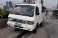 Selling White Mitsubishi L300 2012 at 70000 km in Quezon City-1