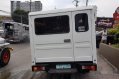 Selling White Mitsubishi L300 2012 at 70000 km in Quezon City-3