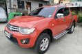 Selling Red Mitsubishi Strada 2014 at 49000 km in Quezon City-0