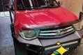 Red Mitsubishi Strada 2012 Automatic Diesel for sale -1