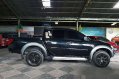 Black Mitsubishi Strada 2011 at 71000 km for sale -2
