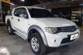Selling White Mitsubishi Strada 2013 Manual Diesel at 51000 km -1