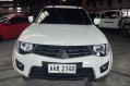 Selling White Mitsubishi Strada 2014 Automatic Diesel -1