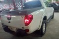 Selling White Mitsubishi Strada 2014 Automatic Diesel -5