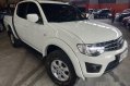 Selling White Mitsubishi Strada 2014 Automatic Diesel -0