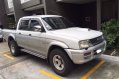 White Mitsubishi Strada 2001 for sale in Quezon City-1