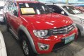 Red Mitsubishi Strada 2013 at 79025 km for sale in Quezon City-0