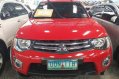 Red Mitsubishi Strada 2013 at 79025 km for sale in Quezon City-1