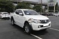 Selling White Mitsubishi Strada 2018 Automatic Diesel -1