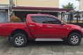 Red Mitsubishi Strada 2014 Automatic Diesel for sale -4