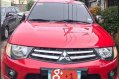 Red Mitsubishi Strada 2014 Automatic Diesel for sale -0
