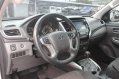 Selling White Mitsubishi Strada 2018 Automatic Diesel -5