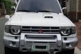 Selling White Mitsubishi Pajero 2004 at 140000 km -0