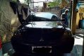 Selling Black Mitsubishi Lancer 2010 Manual Gasoline at 115000 km -1