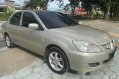 Sell Beige 2007 Mitsubishi Lancer in Talisay-1