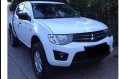 Sell White 2012 Mitsubishi Strada in Concepcion-0