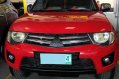 Red Mitsubishi Strada 2011 for sale in Automatic-0