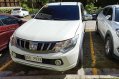White Mitsubishi Strada 2017 for sale in Silang-0