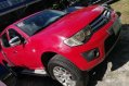 Red Mitsubishi Strada 2011 at 67000 km for sale -1