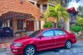 Red Mitsubishi Lancer 2003 Automatic for sale -2