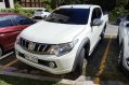 White Mitsubishi Strada 2017 for sale in Silang-1