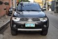 Sell Black 2009 Mitsubishi Montero sport in Quezon City-0
