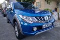 Selling Blue Mitsubishi Strada 2015 in Antipolo-0
