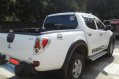 White Mitsubishi Strada 2010 for sale in Manila-2