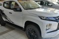 Sell White 2020 Mitsubishi Strada in Quezon City-1