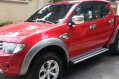 Red Mitsubishi Strada 2012 Truck for sale in Talisay City-1