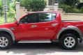 Red Mitsubishi Strada 2012 Truck for sale in Talisay City-2