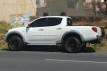 Selling White Mitsubishi Strada 2012 in Marikina City-1