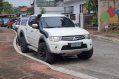 Selling White Mitsubishi Strada 2012 in Marikina City-0