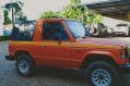 Selling Orange Mitsubishi Pajero for sale in Bustos-1