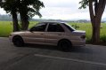 Selling Beige Mitsubishi Lancer for sale in Rizal-0
