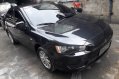 Selling Black Mitsubishi Lancer for sale in Quezon City-1