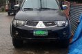 Black Mitsubishi Strada 2013 for sale in Baguio City-2
