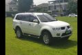 Sell White 2013 Mitsubishi Montero Sport SUV at 100000 km in Manila-0