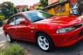 Red Mitsubishi Lancer for sale in Quezon City-0