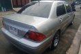 Sell Pearl White Mitsubishi Lancer in Quezon City-2