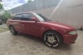 Red Mitsubishi Lancer 2004 for sale in Taytay-2
