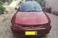 Red Mitsubishi Lancer 2004 for sale in Taytay-0