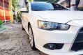 Selling Pearl White Mitsubishi Lancer 2010 in Quezon City-1